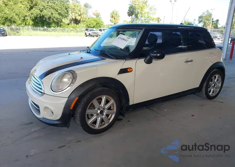 2011 Mini Cooper z USA, uszkodzony, nr VIN WMWSU3C52BT094984